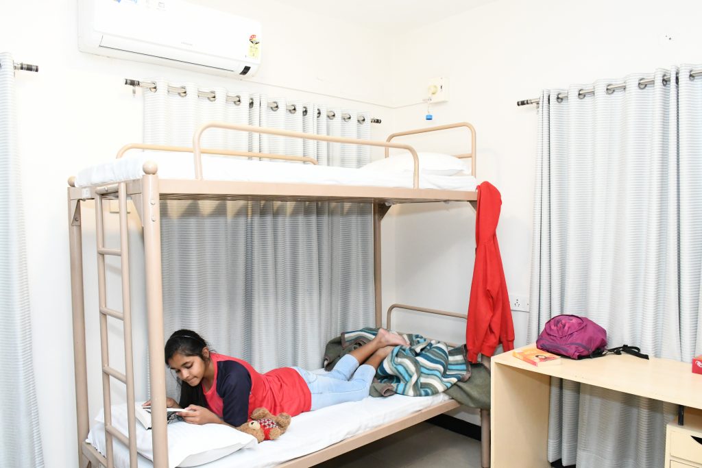 Wockhardt Global School - Residential Facility contain cot, AC and study table for the students at their room